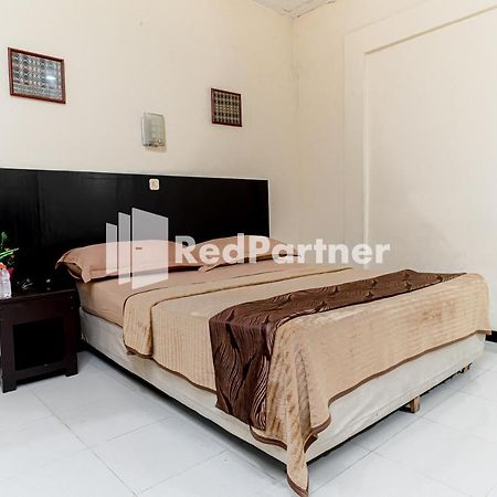 Cherry Pink Hotel Medan Mitra Reddoorz Kültér fotó