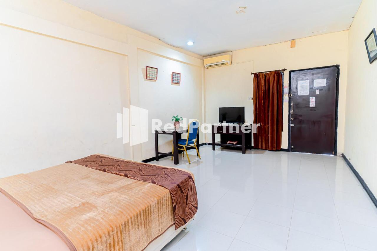 Cherry Pink Hotel Medan Mitra Reddoorz Kültér fotó